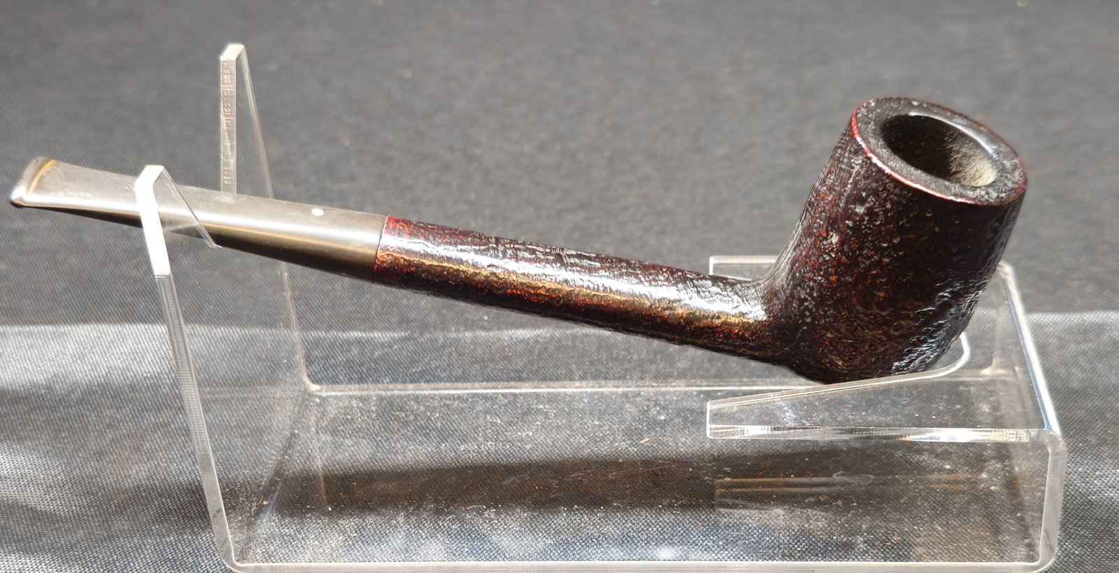 Dunhill Shell Briar ODA 859 Pipe: Dunhill Shell Briar ODA 859 Pipe. English briar tobacco pipe with dark sandblasted finish, large Canadian shape with elongated shank and black tapered mouthpiece with Dunhill white spot. Stamped "ODA