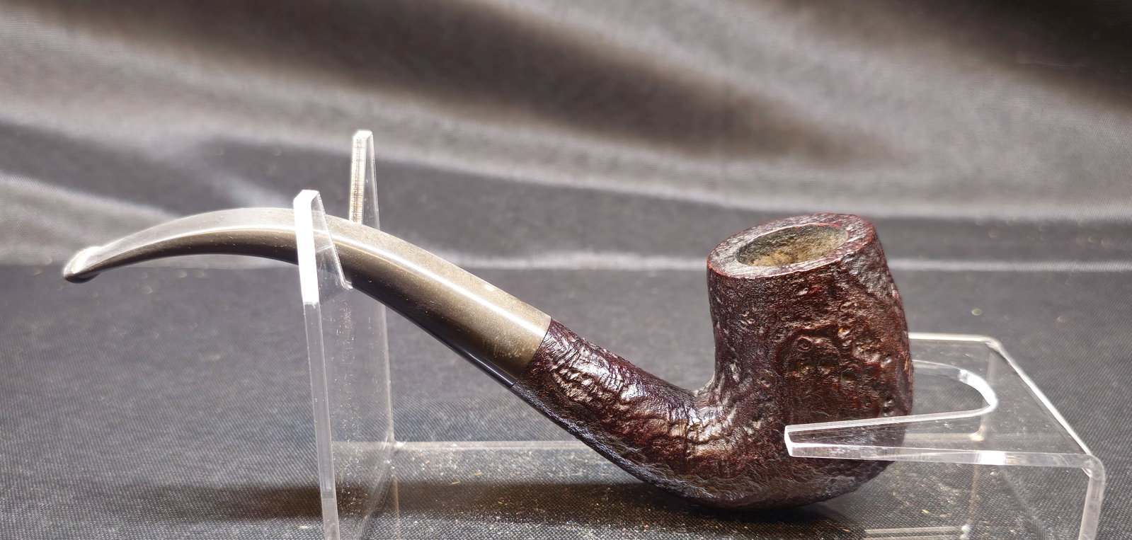 Dunhill Shell Briar 612 Pipe: Dunhill Shell Briar 612 Pipe. English briar tobacco pipe in a bent billiard shape with a dark sandblasted Shell finish and bent vulcanite stem with Dunhill white spot. Underside stamped “612