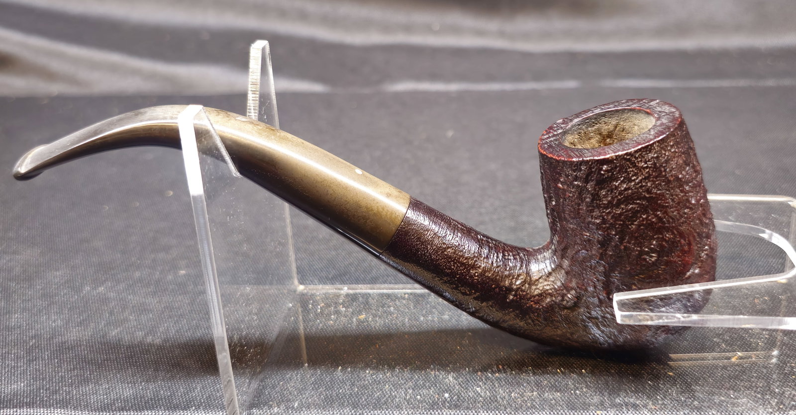 Dunhill Shell Briar 612 Pipe: Dunhill Shell Briar 612 Pipe, English briar tobacco pipe in a bent billiard shape with dark sandblast finish and bent vulcanite stem bearing the Dunhill white spot. Shank marked “612,”