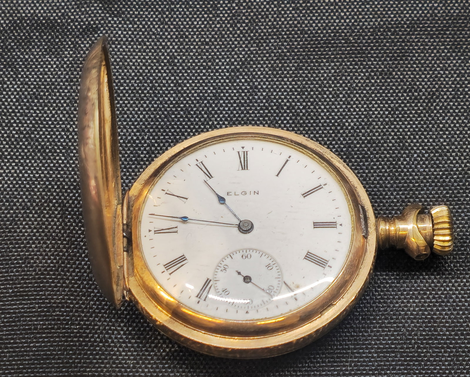 Elgin 14K Gold Filled Hunter Case Pocket Watch: Elgin hunter-case pocket watch with white enamel dial, Roman numeral hour markers, blued hands and subsidiary seconds dial. Housed in a 14 karat special gold-filled hunter case manufactured by The Due