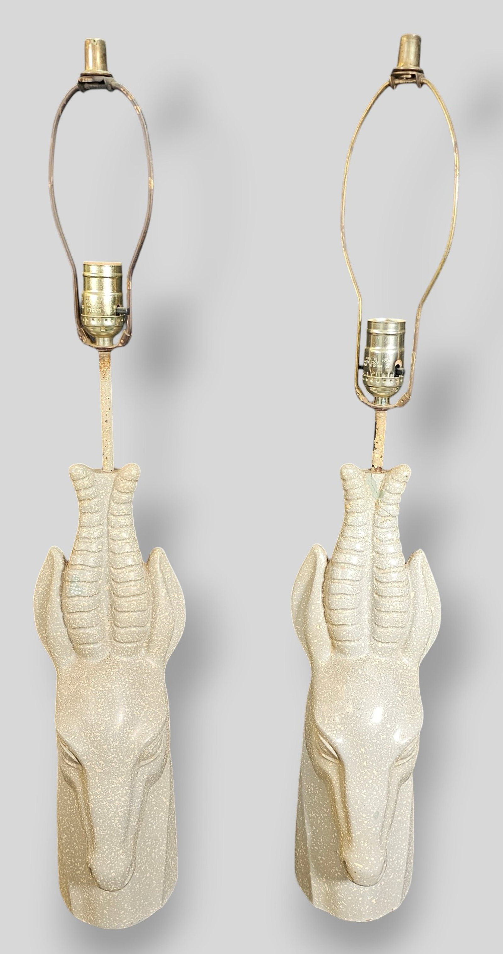 MCM Ceramic Gazelle Table Lamps: MCM Ceramic Gazelle Table Lamps. Pair. USA. 1960s. Glazed ceramic and metal. 5 1/2w x 7d x 30h.