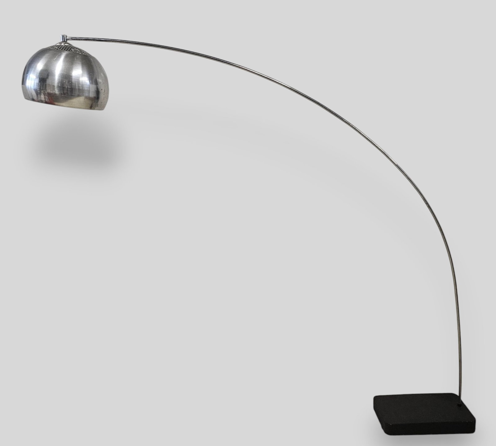 MCM Arc Lamp: MCM Arc Lamp. USA. 1970. Lacquer slab base, chrome plated metal and perforated metal. 82w x 10 1/2d x 75h.