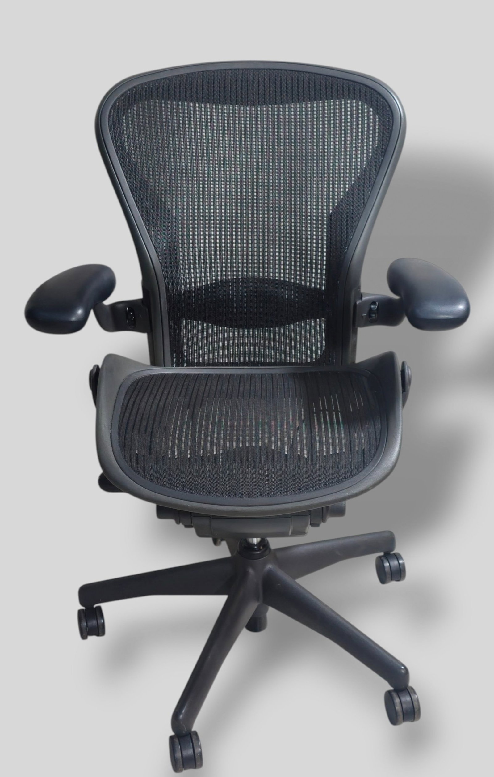 Herman Miller Aeron Chair Size B: Herman Miller Aeron Chair Size B. 27w x 17d x 41h. SH- 14 1/4 to 22 1/4.(Adjustable)