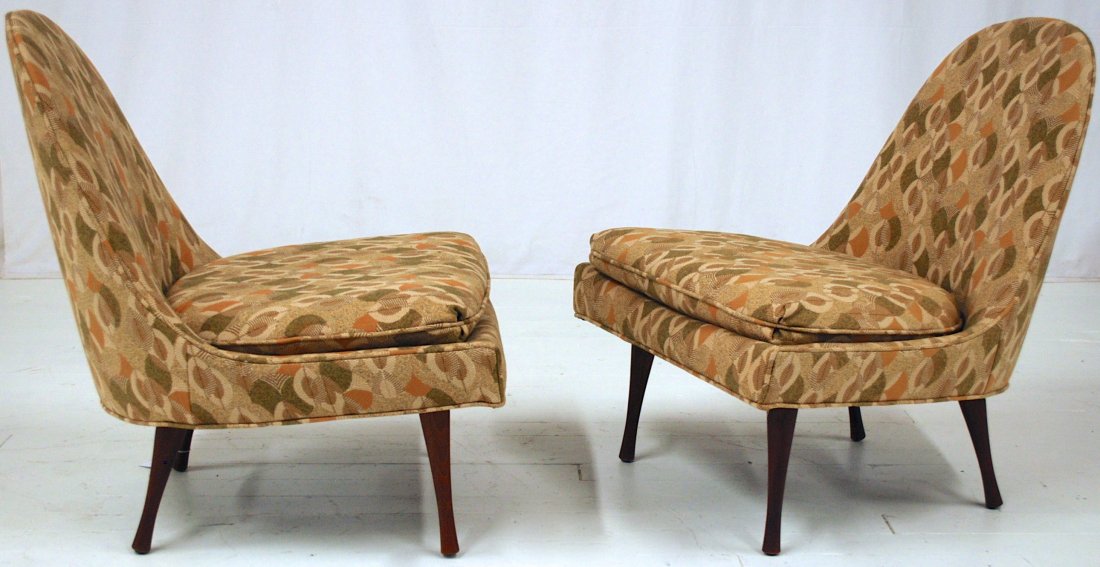 Paul McCobb: Walnut and upholstery. Slender sexy slipper chairs, tapered legs. Manufactured by Widdicomb. 27 x 27 x 31.5.