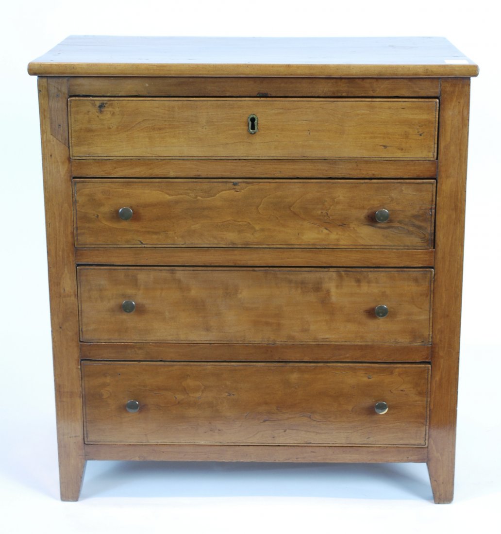 Kentucky Miniature Hepplewhite Chest: Circa 1830 in cherry with 4 dovetailed graduated drawers with scored cock beaded edges. Top drawer with original lock, lower drawers with original brass pulls, paneled ends and French feet, polar seco