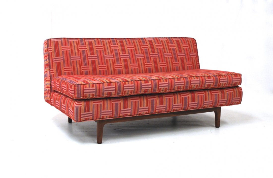 Jens Risom: Armless sofa possibly Boris Kroll upholstery. Walnut. Companion to Lot# 040 which has original label. Size. 57L x 40.5D x 27H