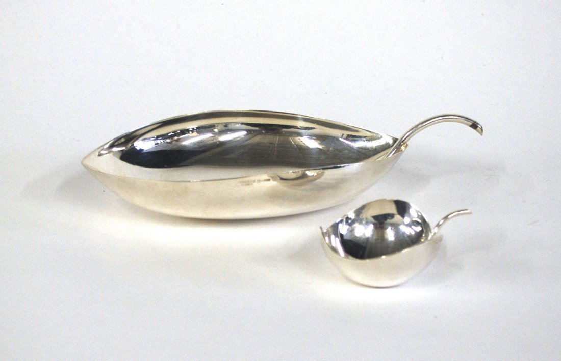 Lino Sabattini: Two leaf bowls. Christofle. Italy/France. 1956. Manufacturer's mark to both examples. Christofle France Coll Gallia. 9.5 x 4.5 x 2. Smallest 3.25 x 2.5 x 1.5.