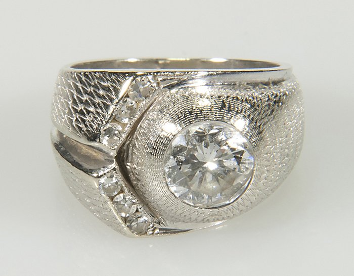 14KT White Gold & Diamond Man's Ring: 14kt white gold and diamond man's ring. Center diamond, approx. 1.15cts and 6 single cut diamonds. Total weight, including stones, approx. 6.8dwt. Collection of Tom Powell.