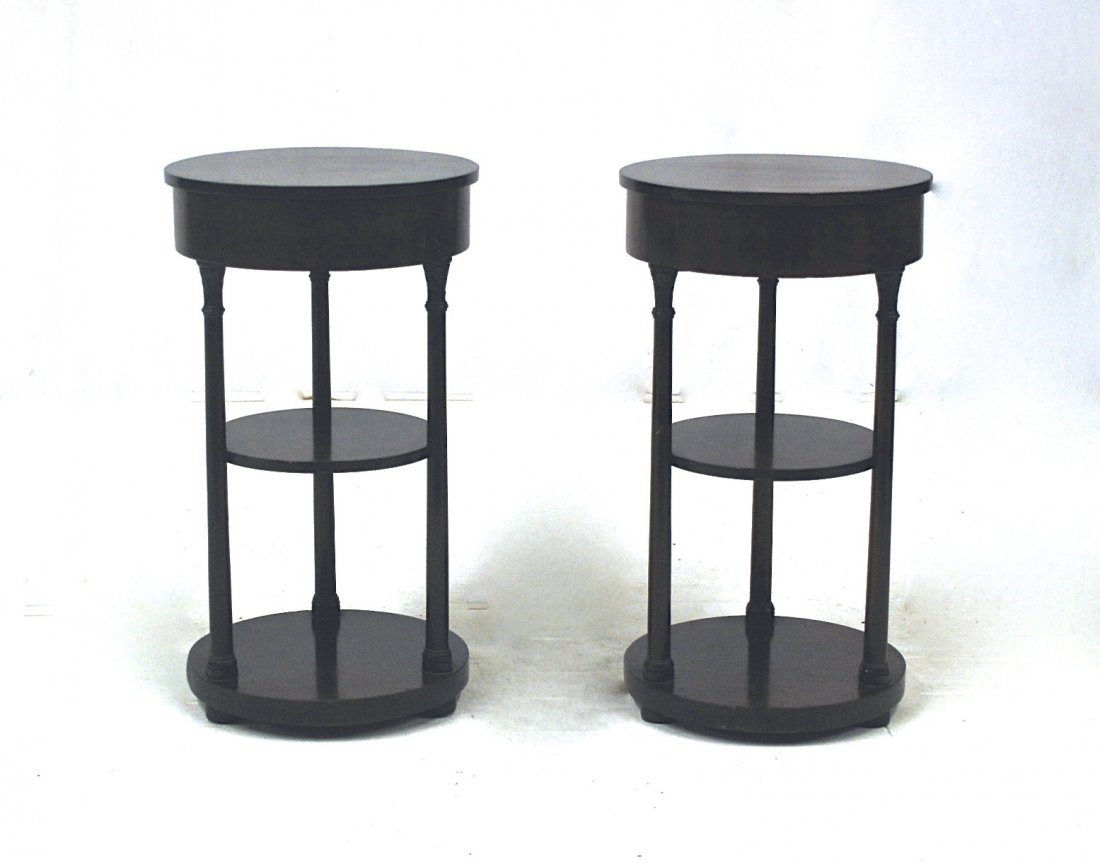 Tommi Parzinger (Attribution): Pair of three tier tables with simple elegant columns. Manufacturer's mark to each drawer. Charak furniture. 16 diameter x 28.75H