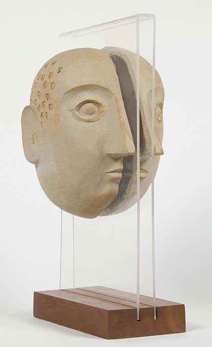 David Gil: Unknown subject and unsigned profile of a head. Bennington Pottery, Vermont. The "Jo-jo" sculture. Ceramic, Lucite and Walnut. The title was given when nephew asked, "Is that Uncle Jo-Jo?". "Jo-Jo" is