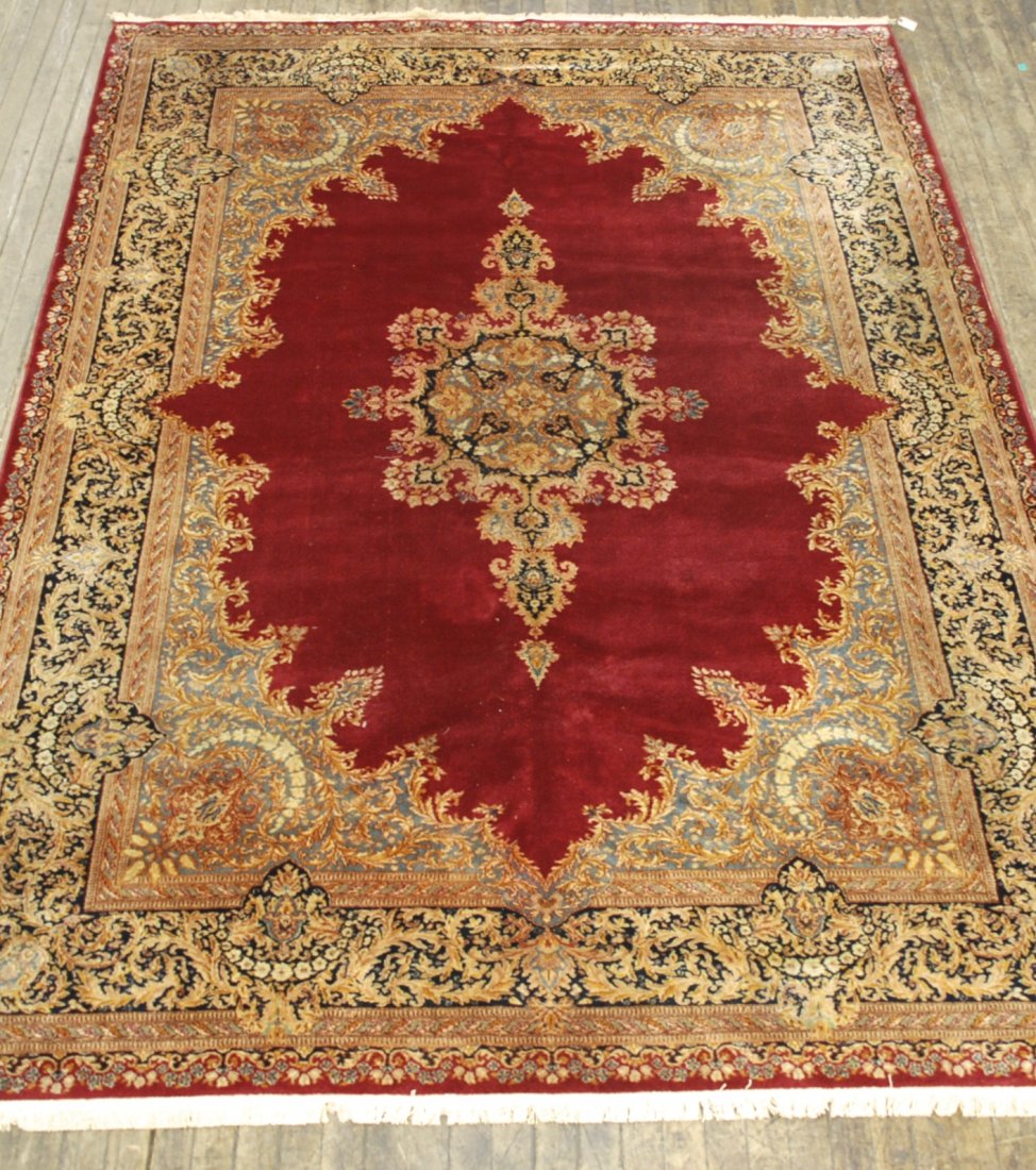Kerman: Medallion center, beige, red, black, blue. 118 x 168. Collection of Tom Powell