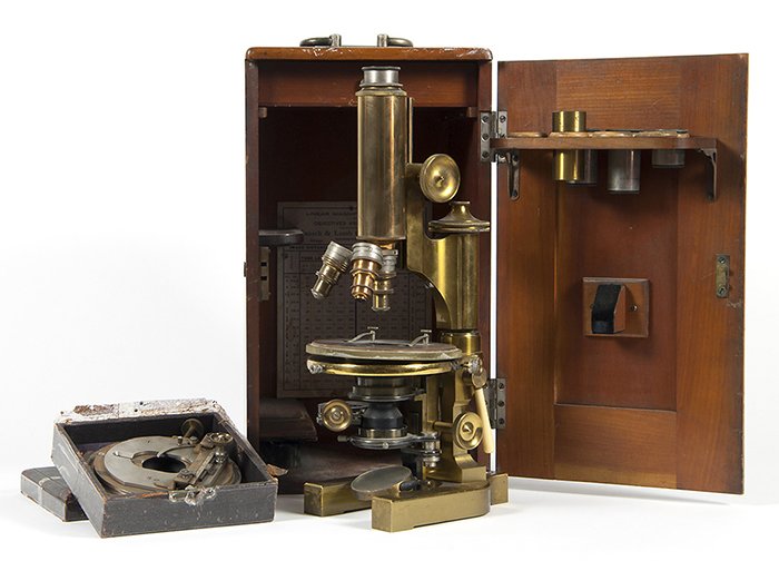 Bausch and Lomb Optical Microscope: Brass telescope #25314, signed on base. Original wood case and mechanical stay lens. Appears to be missing lenses. Microscope - Size 6w x 8d x 14.25h