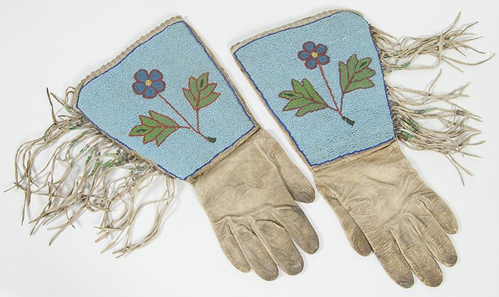 Pair Plain Beaded Gauntlets: Circa 1910, with nice floral pattern in light blue, green, medium blue, red and yellow beads with fringe having clear and green beads, made for small male or large Female hand and still quite supple a