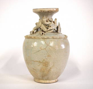 13th Century Chinese Southern Song Vase: Vase decorated with a dragon, qingbai ware, (Fujian) porcelain with a bluish glaze. Size, 11H. Collection of Dr. Robert Kemper.