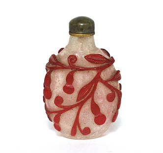 19th Century Snuff Bottle: Carved red and white glass, Qing Dynasty. Size, 2.5H. Collection of Dr. Robert Kemper.