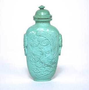 19th Century Snuff Bottle: Turquoise colored glass, Qing Dynasty. Size, 3.25H. Collection of Dr. Robert Kemper.