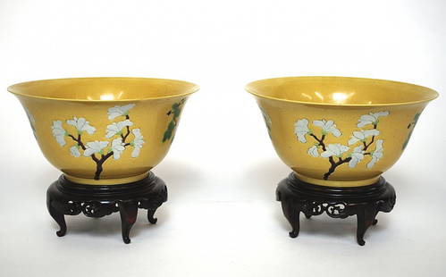 Pair of 16th Century Brinjal Bowls.: Pair of bowls with floral designs. Porcelain with yellow, green and white over glaze enamels on stands. Circa 1700-1720. Qing Dynasty (Kanxi reign). Size, 7. 5/8 diameter, 3 5/8 Height. Collection of