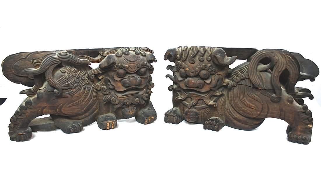 Pair of 18th Century Shishis: Wood with traces of pigment, circa 1790. Size, 19 x 7 x 11. Collection of Dr. Robert Kemper.