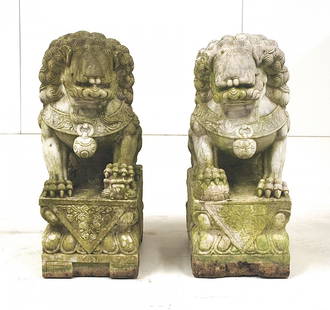 Outstanding 19th Century Foo Dogs: Pair of marble Foo Dogs resting on Lotus form base. Amazing detail. Size, 12.5W x 17D x 30.5H