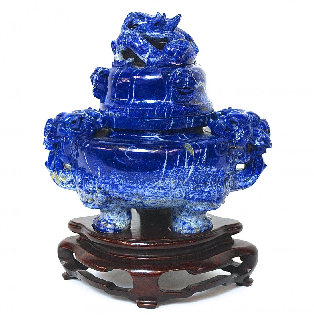 Chinese Lapis Foo Lion Censor: Ornate two piece censor with claw feet, carved Foo lion faces and handles. Carved wrapped dragon handle on Teak stand. Size, 7.75 (including stand)