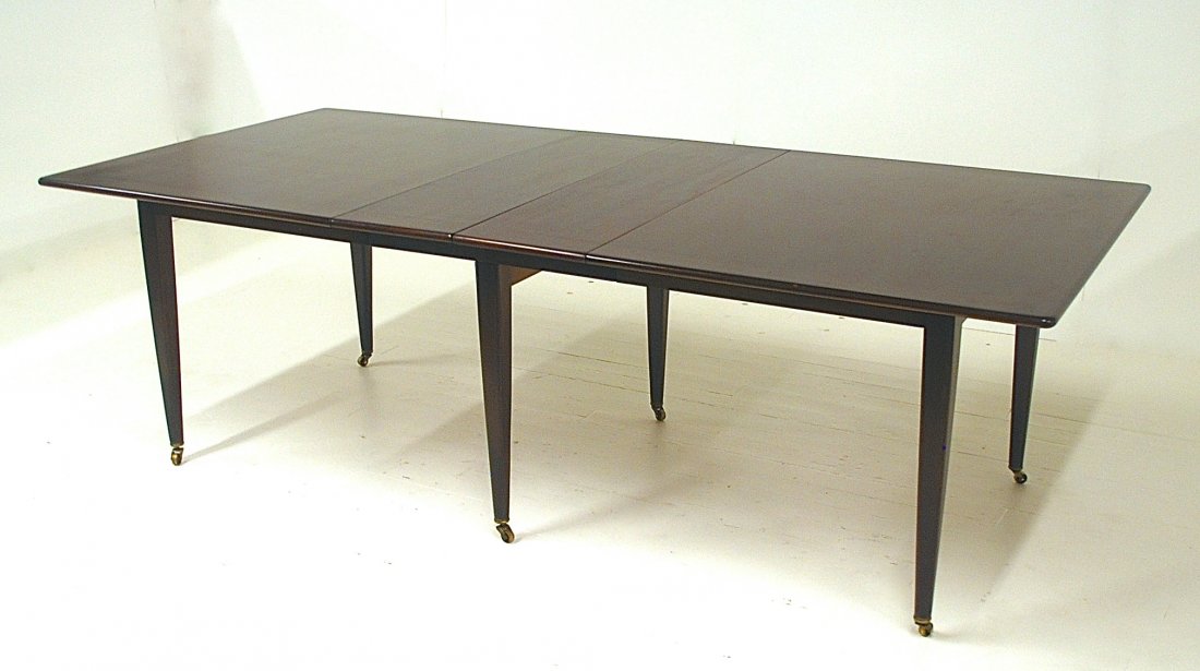 Edward Wormley: Extension dining table. Dunbar, 1950. Mahogany. Two 12 inch leaves, open 94L x 44W x 29H. Closed 70L