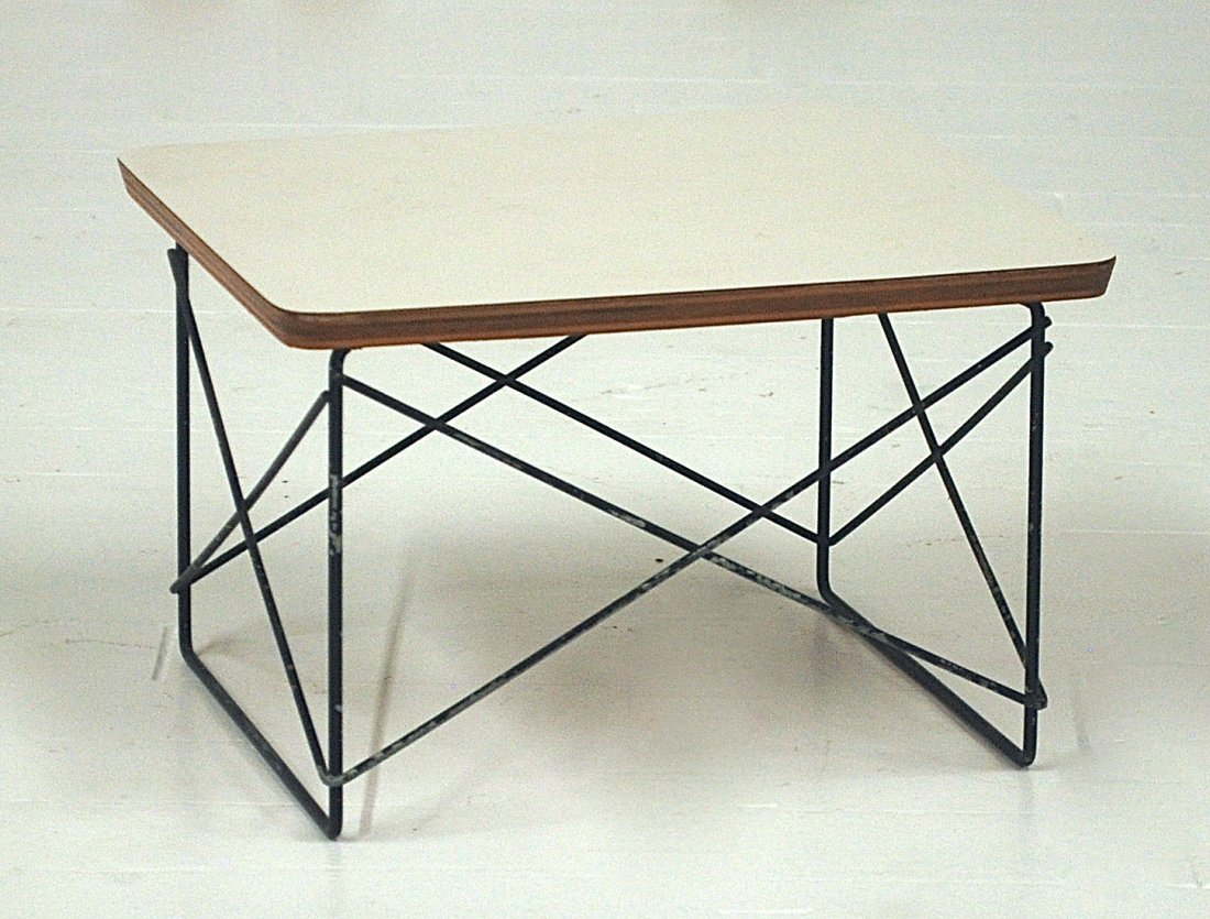Charles and Ray Eames: Early "LTR" occasional table. Oak, rubber and steel. Size, 15.25W x 13D x 9.75H