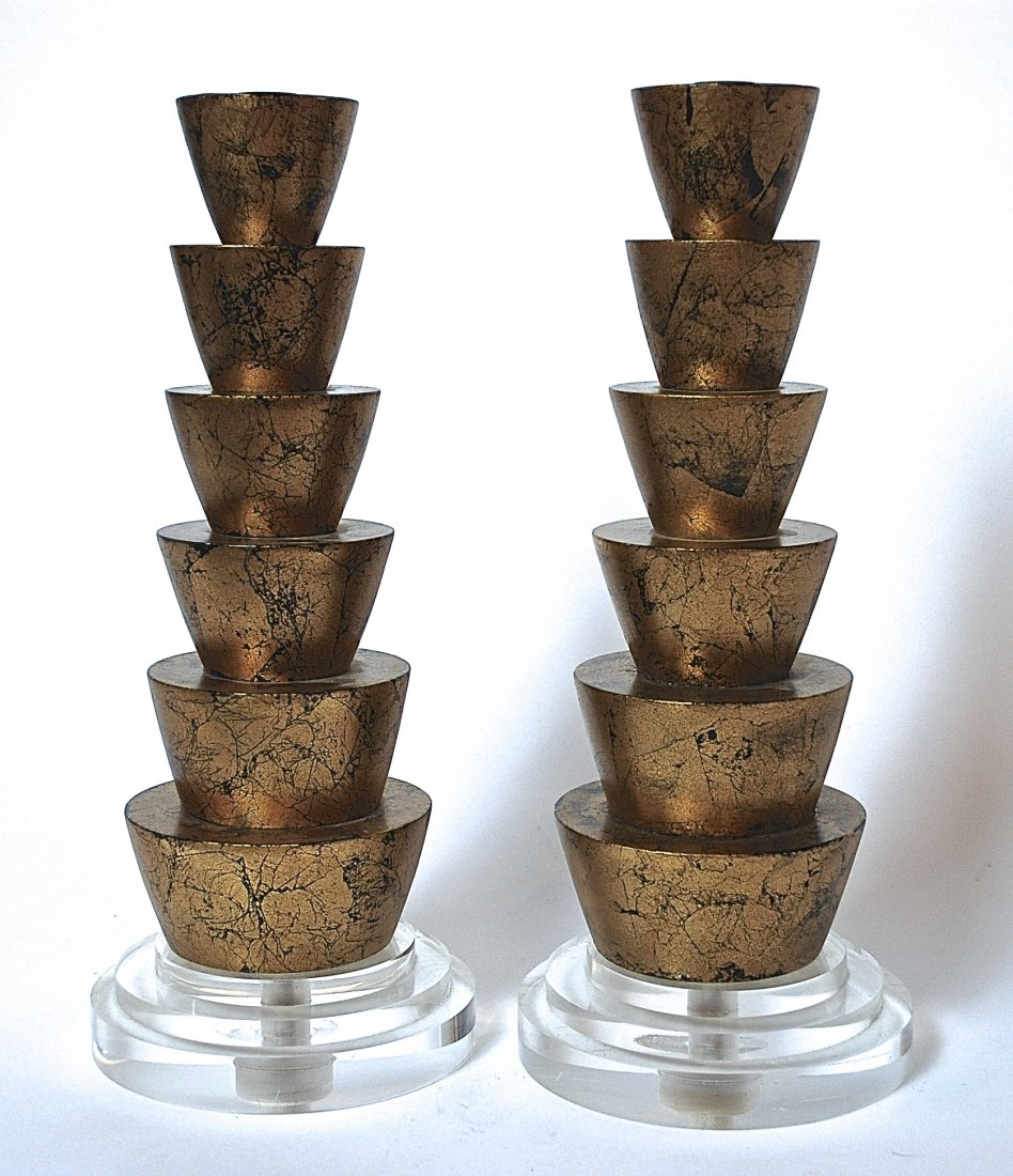 Memphis Style Candlesticks: Pair of lacquered six tier candlesticks on layered Lucite base. Size, 16.75H
