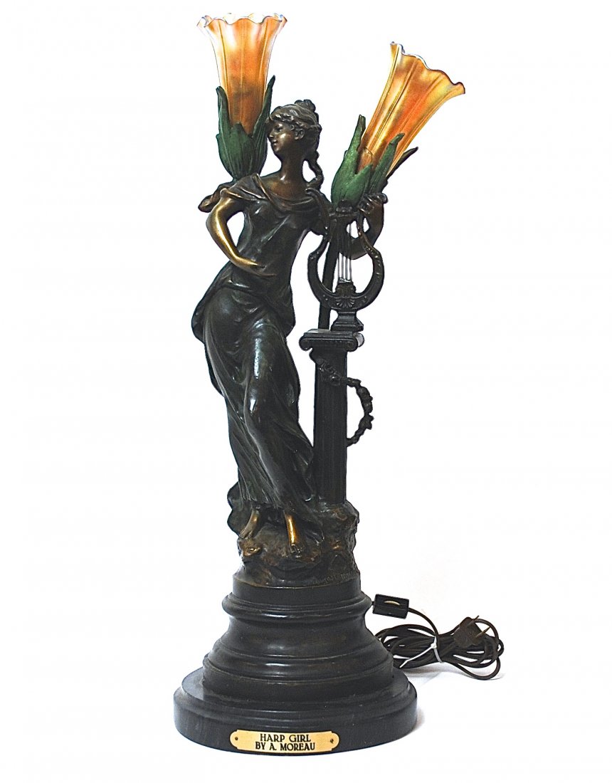 After Auguste Moreau Bronze Knoll-Post Lamp: Art Nouveau style bronze entitled “Harp Girl, in three color patination of a young lady with harp resting on classical column, signed on base “Auguste Moreau, with two Tiffany Favrile style lily s