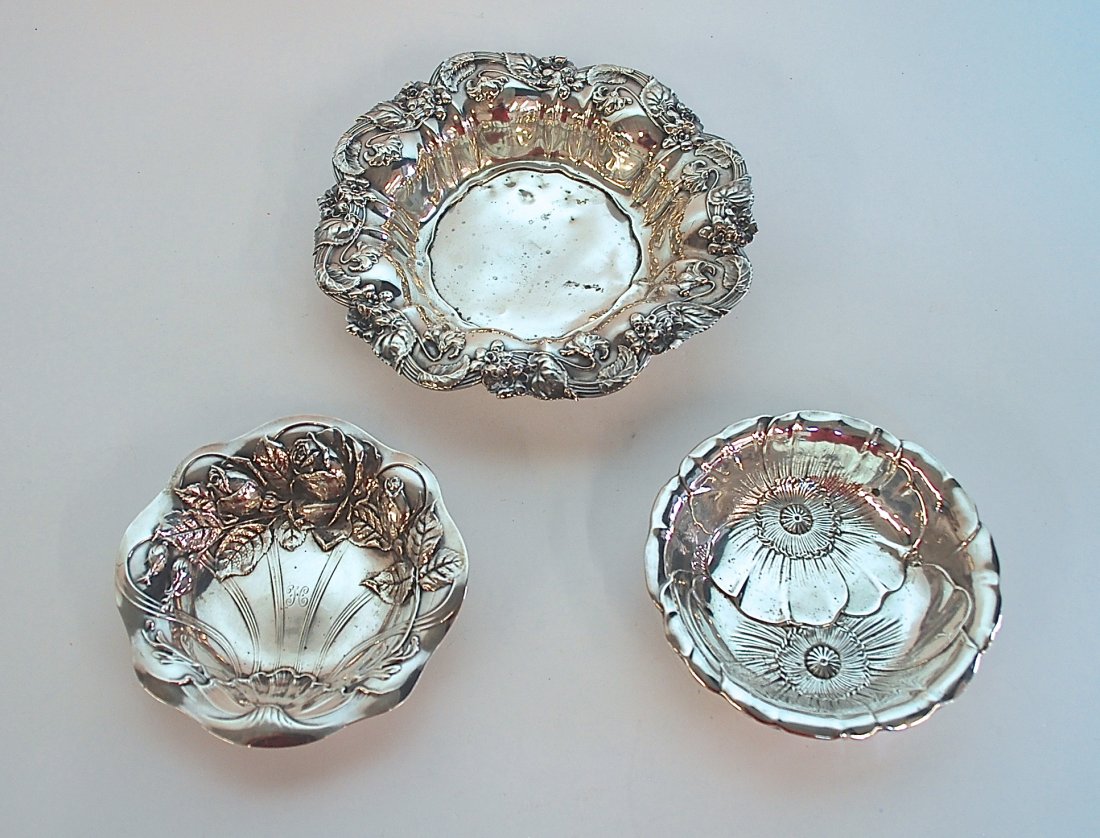 Assembled Sterling Bowls: Three floral pattern bowls, manufacturers mark to underside, one hallmarked. RW &S, Wallace #123, and unknown manufacturer. 13ozt.