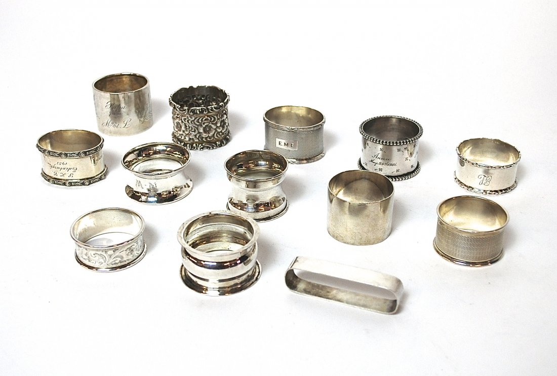 Assembled Sterling Napkin Rings: Eight with British Hallmarks and five American Hallmarks. Approx. 9ozt