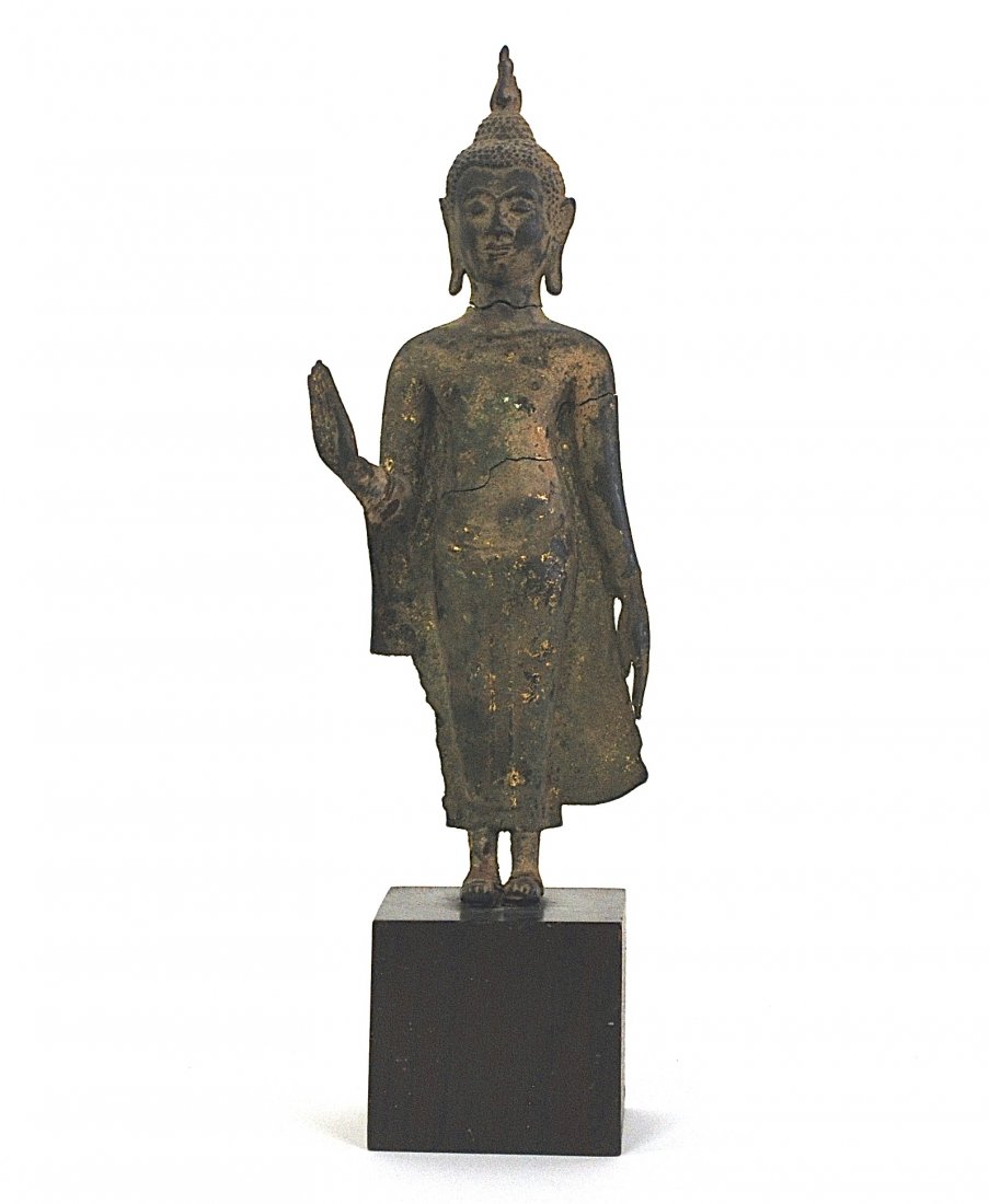 13th /14th Century Thai Bronze Standing Buddha: Traces of gilt mounted to wood cube base. Size, Height 15.5 Buddha only 12". Collection of Dr. Robert Kemper.