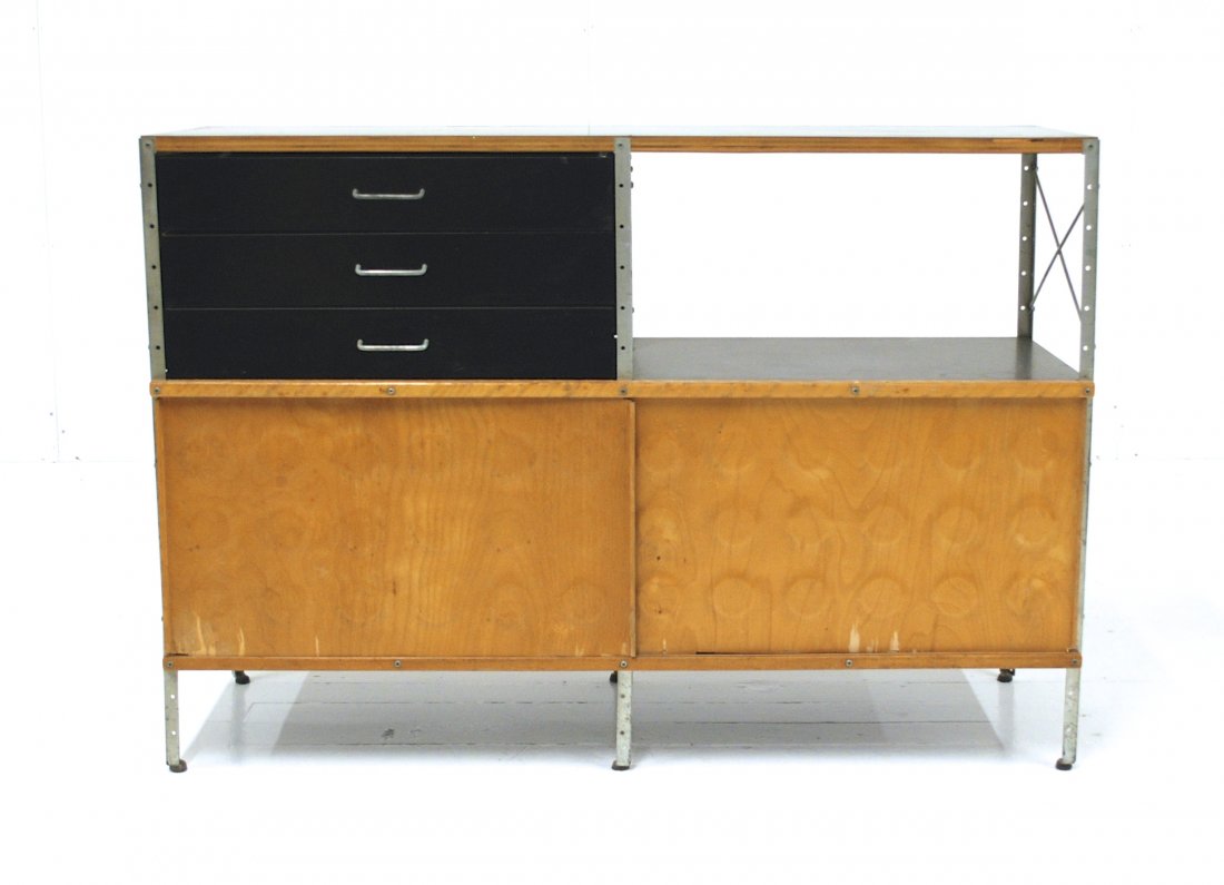 Charles and Ray Eames: 200 N 1st generation ESO, Early drawer configuration, original black front. Birch, plywood, lacquered Masonite, laminate, zinc-plated steel. Signed with applied Eames ESU label/ Herman Miller. Herman 