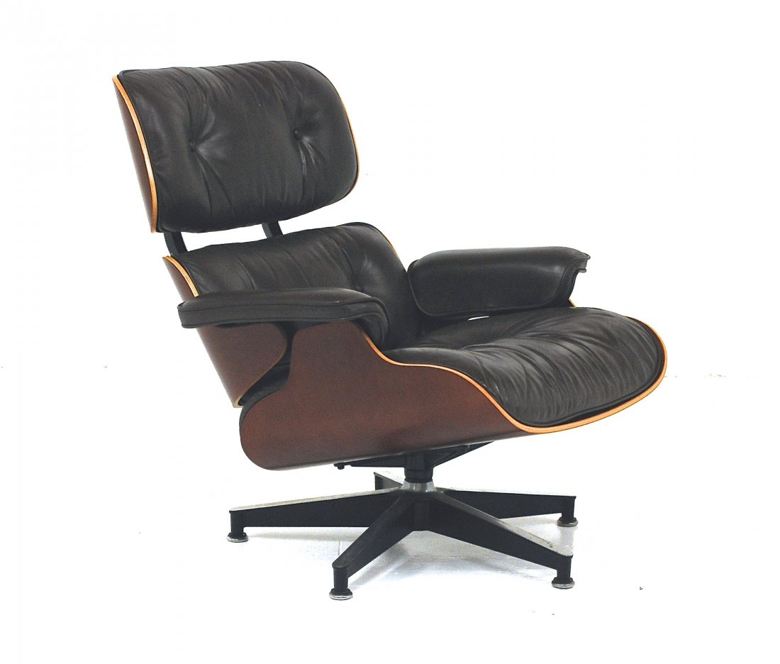 Charles and Ray Eames: 670 lounge chair, Herman Miller. Cherry, leather, aluminum, enameled steel, rubber. Size Chair 33.5w X 34d X 32h.