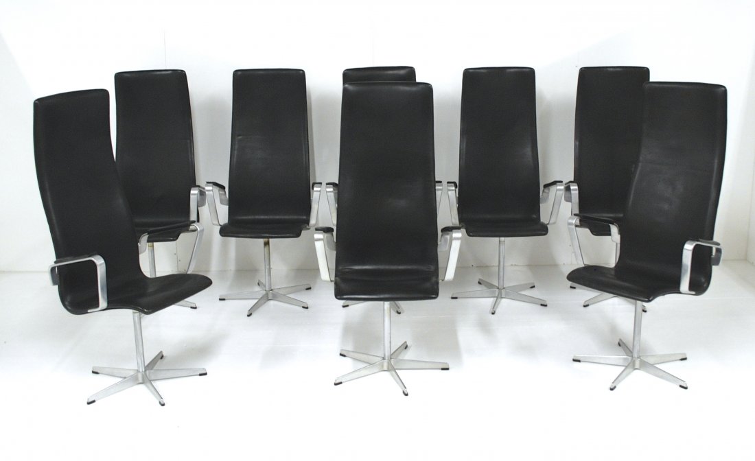 Arne Jacobsen: "Oxford" chairs, set of eight. Fritz Hansen , matte chromed steel, leather, rubber. Size 24.25L x 23D x 50H