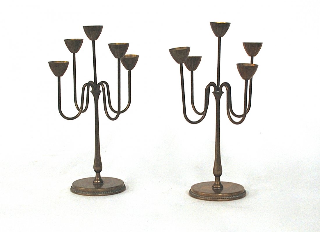 Gunnar Ander for Ystad Metall Candelabras: Rare pair of five branch candle holders. Designed by Gunnar Ander. Manufacturer's mark to underside. Brass Size 7.75W x 7.75D x 12.5H.