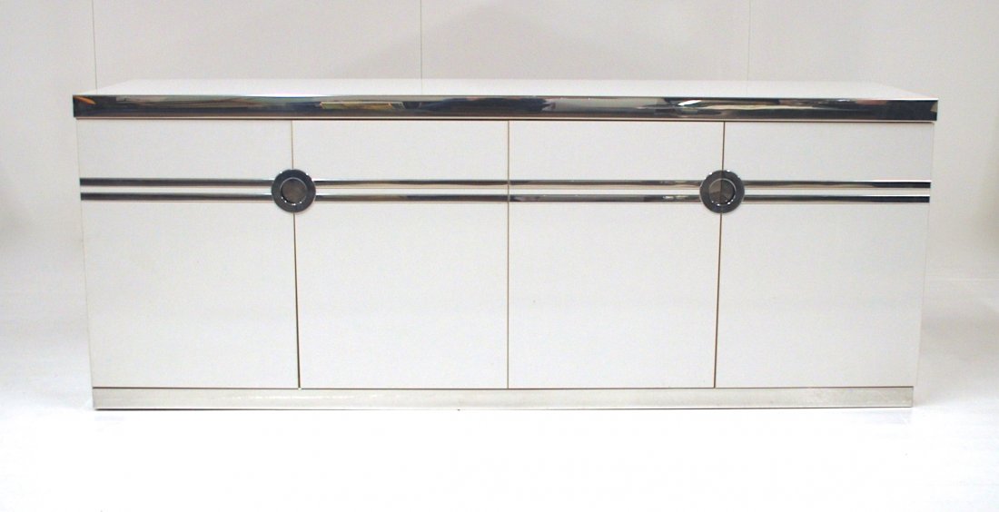 Pierre Cardin: Credenza. Four door concealing six drawers. Laminate and chrome plated metal. Signed to right side trim. Size 74.25 x 19D x 28.25H
