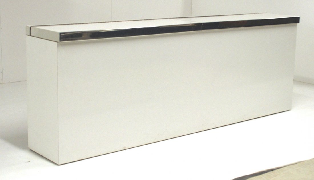 Pierre Cardin: Headboard. Two hinged top doors, laminate, chrome, plated metal. Signed to right side trim. Size 80W x 14D x 28.25H