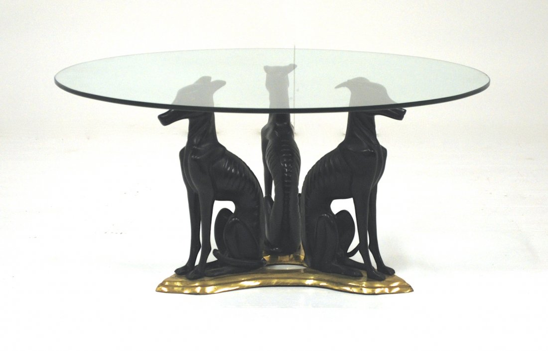 Mastercraft: Round Doverman coffee table. Brass, enameled metal, glass. Size 39.25 diameter X 16.25h.