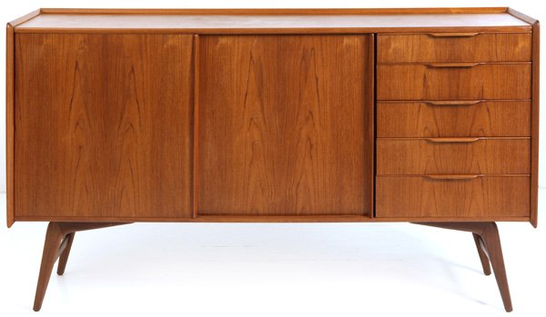 Nils Moller: Credenza/sideboard. Two doors, five drawers. Randers. Teak. Size 7.25W x 18.5D x 43H.
