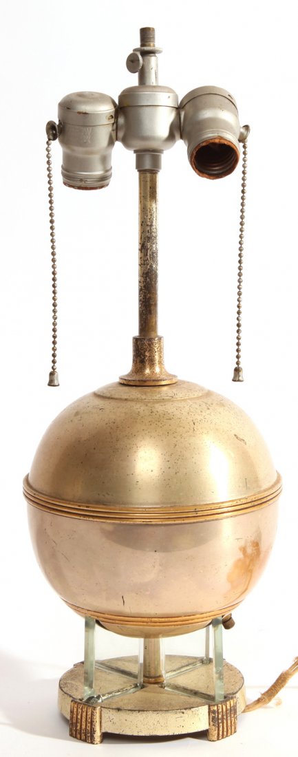 Desny: Table lamp, France 1920's.Interior light. Nickel plated brass, brass, glass. Minor chip to glass and minor loss to finish. Size 6.5 diameter X 18h.