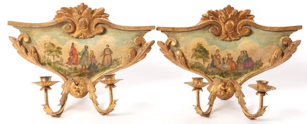19th Century French Sconces: Pair of hand painted figural scene sconces. Gilded center pediment, Acanthus leaf borders and candle holders. Size 16.5W x 8.5D x 12H.