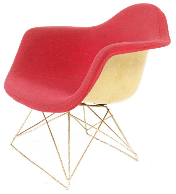 Charles and Ray Eames: "LAR" chair, Cat's cradle base. Early red Herman Miller Label. 1950. Size 25W x 25D x 24.5H.