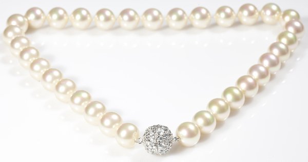 Pearl Choker: Pearl choker with rhinestone clasp. 8/1/2 " not marked