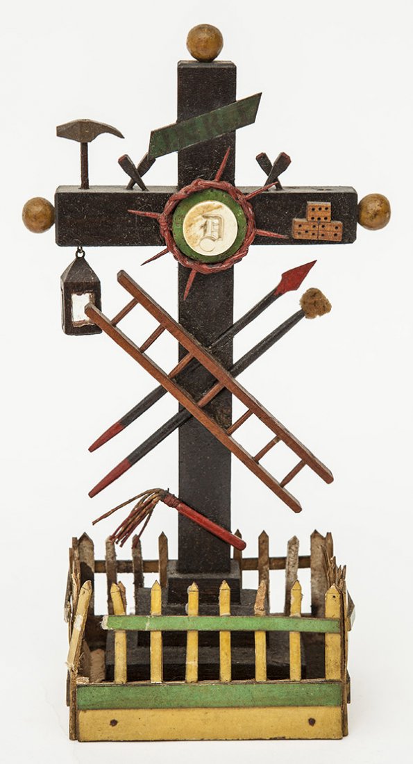 Folk Art Fraternal Cross: with many symbolic items attached, such as hammer, chisels, ladder, whip, dice, spear, crown of thorns, lantern and more. In mixed woods with card stock surrounding fence and engraved bone plaque insi