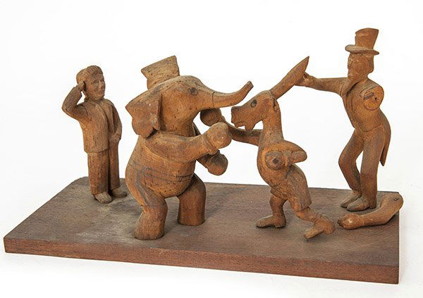 Folk Art Political Carving: Comic American political theme of boxing Democratic Donkey and Republican Elephant, while Uncle Sam acts as referee and a man in suit watches; some inked details, on mahogany base, circa 1920's. perio