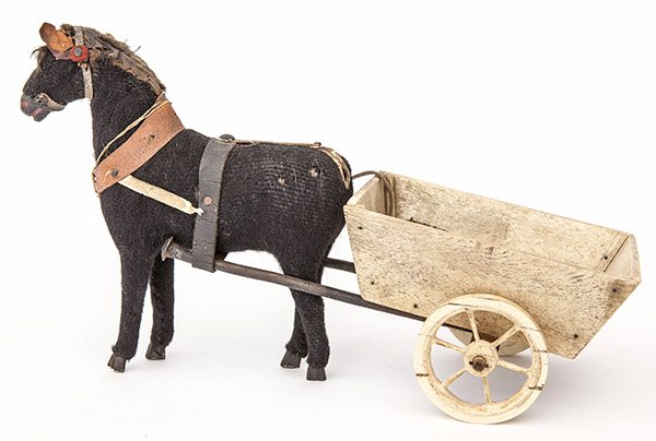 Scrimshaw Horse & Cart Toy: a circa 1880's folk art toy horse and cart. The horse is a typical Victorian fabric covered stuffed toy with wood legs and muzzle, with leather ears and harness. While the two wheeled cart is whale 