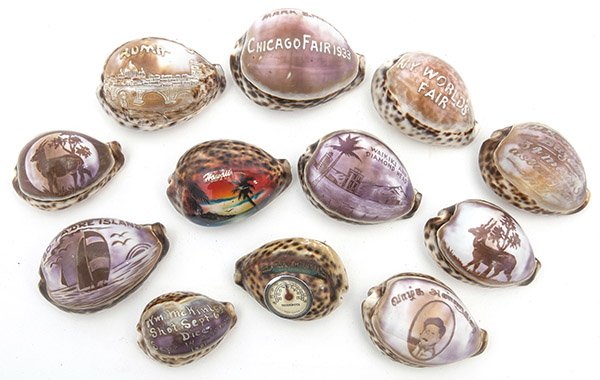 Lot of Souvenir Cameo Shells: lot of 12, including "Chicago Fair 1933"; "N.Y. World's Fair"; "Roma" with cityscape; "J.H. Beringer's Bazaar 34 Main St. Asbury Park, N.Y."; one with inset thermometer; "Hawaii"; "Waikiki And Diamond