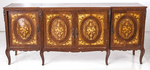 Parquetry Inlaid Sideboard: French four door sideboard with ornate parquetry flowering inlay and scalloped top. Resting on six cabriole legs. Size 88w x 20.5d x 37.5h.