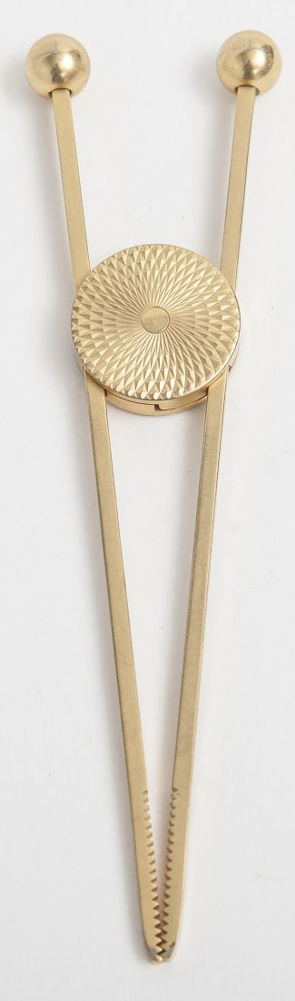 Jacques Adnet: French brass ornate ice tongs. Geometric center medallion. Stamped France. 1940's