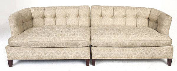 William (Billy) Haines: Custom two piece tufted sofa. Oriental motif design to upholstery. Mahogany, upholstery, 96w x 33d x 27.5h